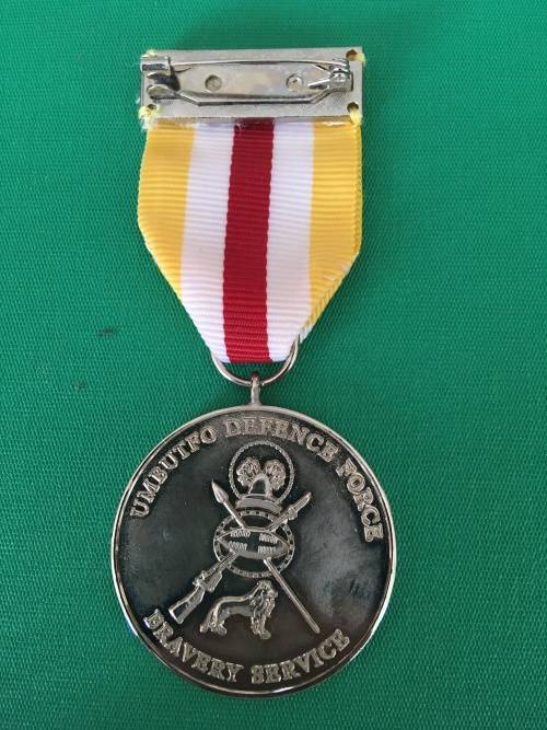 Original and Scarce Full Size SWAZILAND medal for - BRAVERY SERVICE Umbutto defence Force.