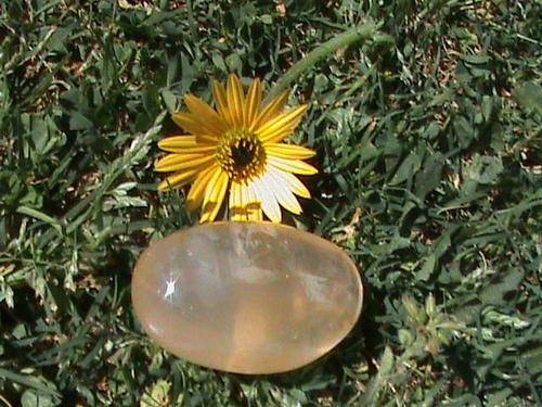 QUARTZ CRYSTAL GALET WITH HEMATOID (ORANGE) INCLUSIONS...RARE
