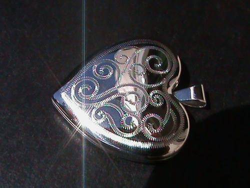 STERLING SILVER HEART LOCKET PENDANT... !
