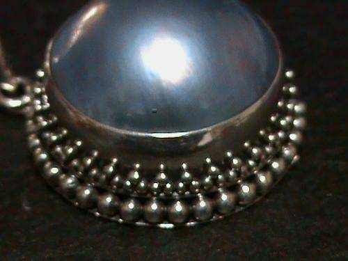 LARGE BLUE MABE PEARL SET IN STERLING SILVER.....