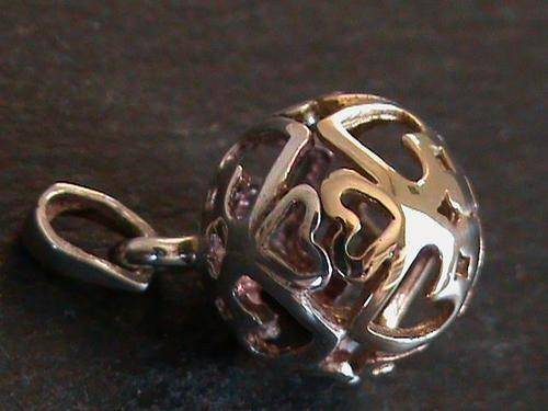 STERLING SILVER AND 9 CT GOLD BALL PENDANT..............