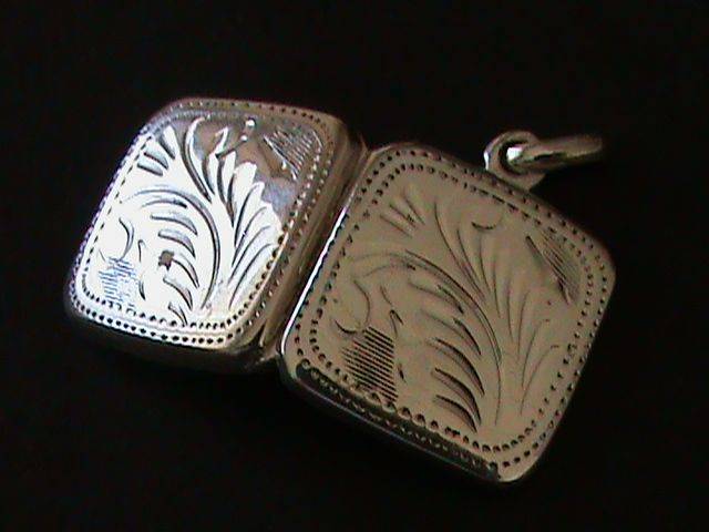 SOLID STERLING SILVER LOCKET...