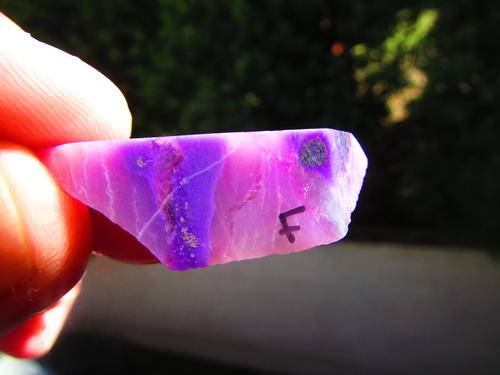 SUGILITE CUTTING MATERIAL.  A GRADE .   VERY RARE