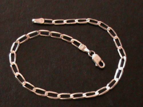 SOLID STERLING SILVER BRACELET.   22 CM LONG