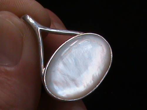 STERLING SILVER AND MOTHER OF PEARL PENDANT.......