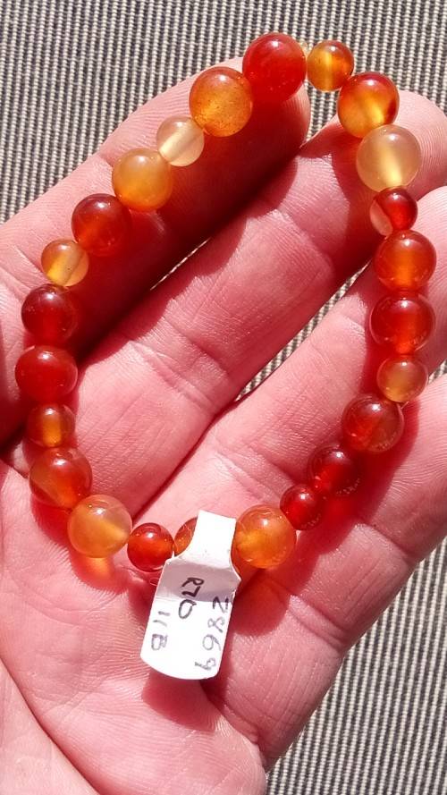 CARNELIAN GEMSTONE BRACELET.  STRUNG ON ELASTIC.  8 MM AND 6MM BEADS.