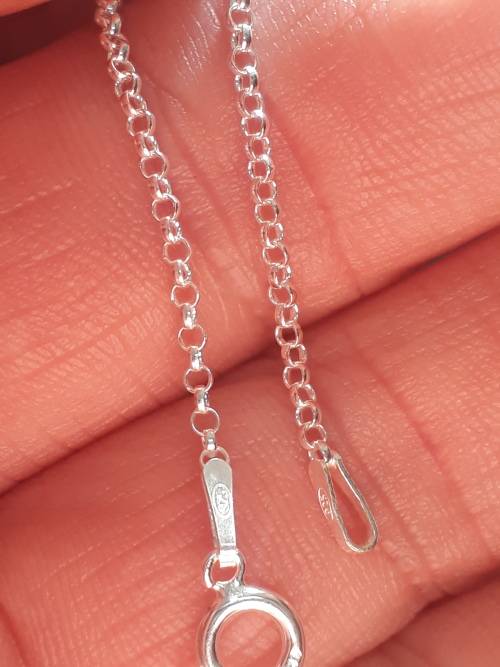 SOLID STERLING SILVER CHAIN.   60 CM LONG.