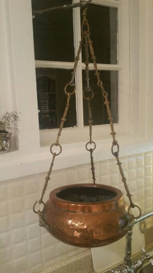 A Vintage Copper and Brass Hanging Plant Holder: Monkey Face Brass Detail