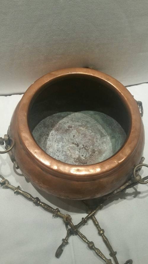 A Vintage Copper and Brass Hanging Plant Holder: Monkey Face Brass Detail