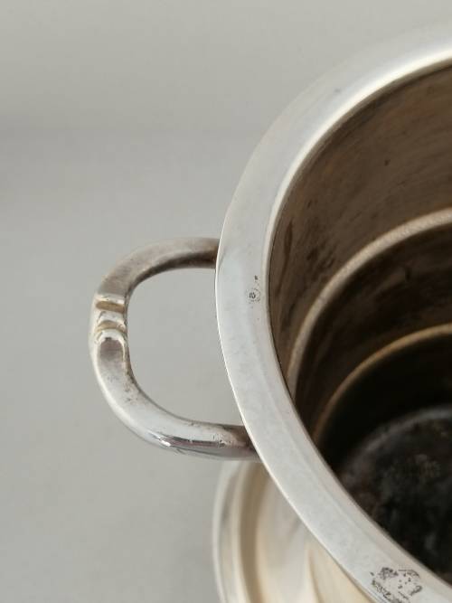 A Classic Silver Plated Ice Bucket with Coaster