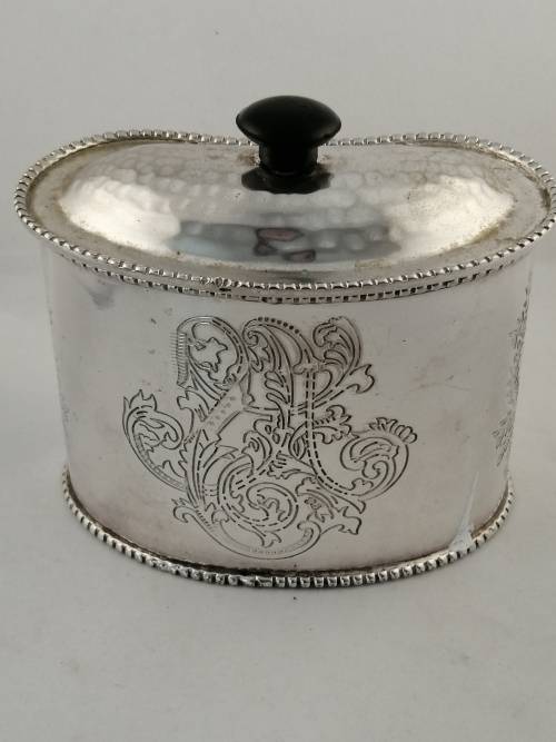 A Silver Plated Kidney Shaped Lidded Tea Caddy