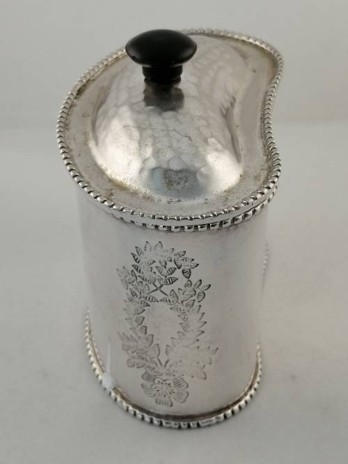 A Silver Plated Kidney Shaped Lidded Tea Caddy