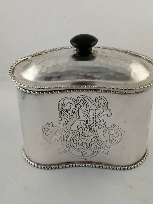 A Silver Plated Kidney Shaped Lidded Tea Caddy