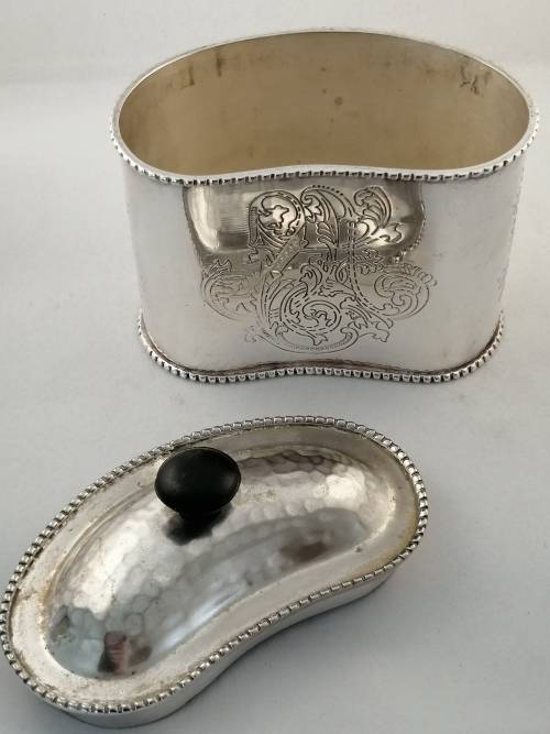 A Silver Plated Kidney Shaped Lidded Tea Caddy
