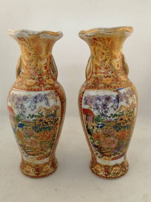 A  Pair of Oriental Style Vases