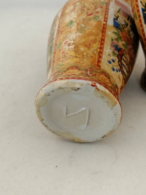 A  Pair of Oriental Style Vases