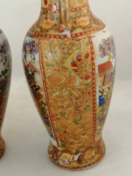 A  Pair of Oriental Style Vases