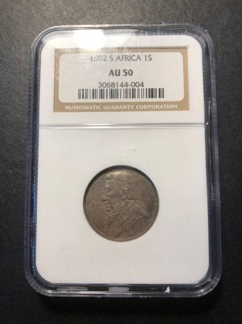 Very nice 1892 ZAR 1 shilling silver coin graded AU50 by NGC - Looks Undergraded