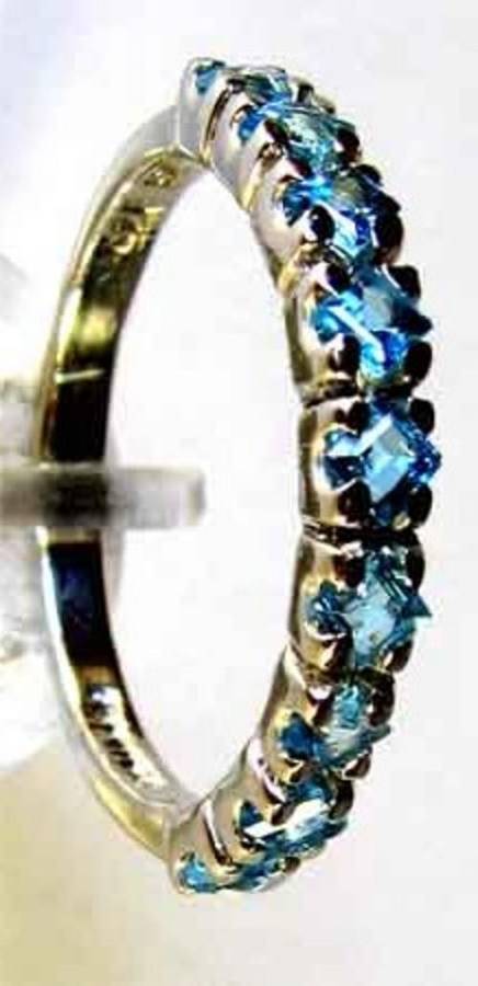 Sterling Silver, & Genuine Blue Topaz Ring.