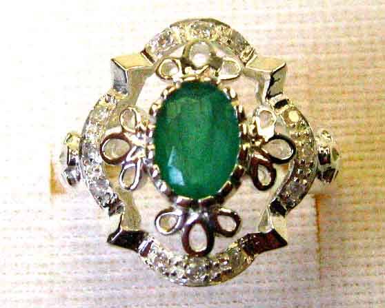 Genuine Sterling Silver, Emerald  and Diamonds Ring.