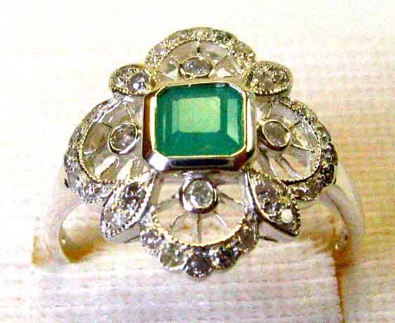 Genuine Sterling Silver, Emerald and Diamonds Ring.