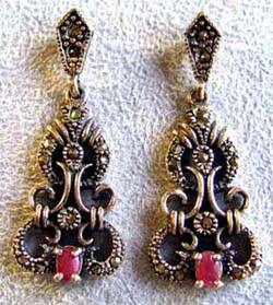 Unusual, A Pair of Sterling Silver, Marcasite and Genuine Rubies Earrings
