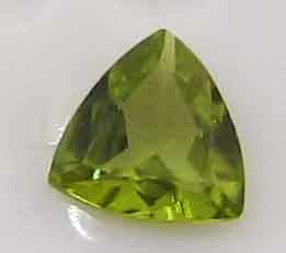 6.00 mm trillion faceted cut peridot 0.75 ct.