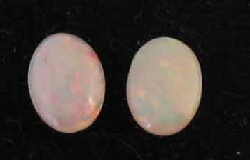 2 pieces -6.00 x 4.00 mm Oval Solid Opals , T. W. 0.48 ct.