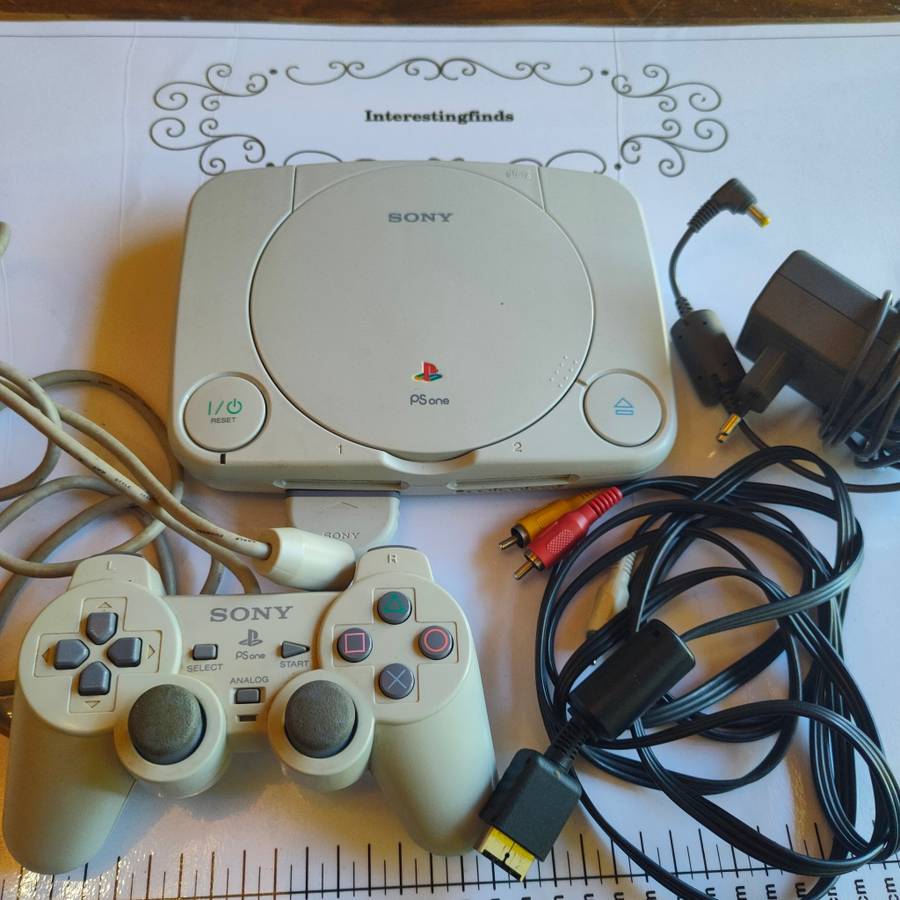 Original Sony Playstation one (PS one) with original controller and cables
