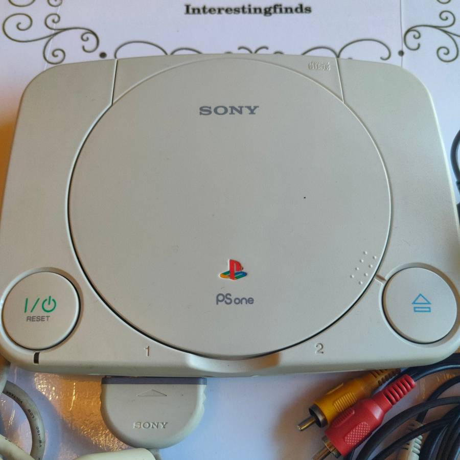Original Sony Playstation one (PS one) with original controller and cables