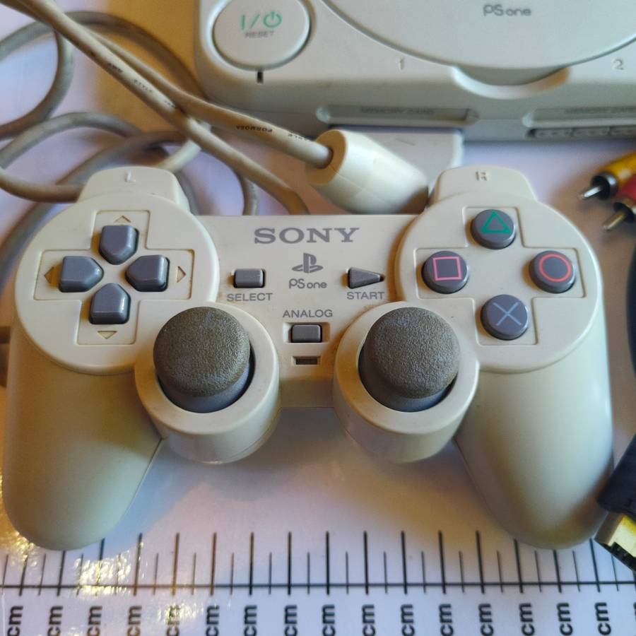 Original Sony Playstation one (PS one) with original controller and cables