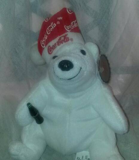 Very collectable! Coca-cola Bean Bag Plush. So pretty! With tags!