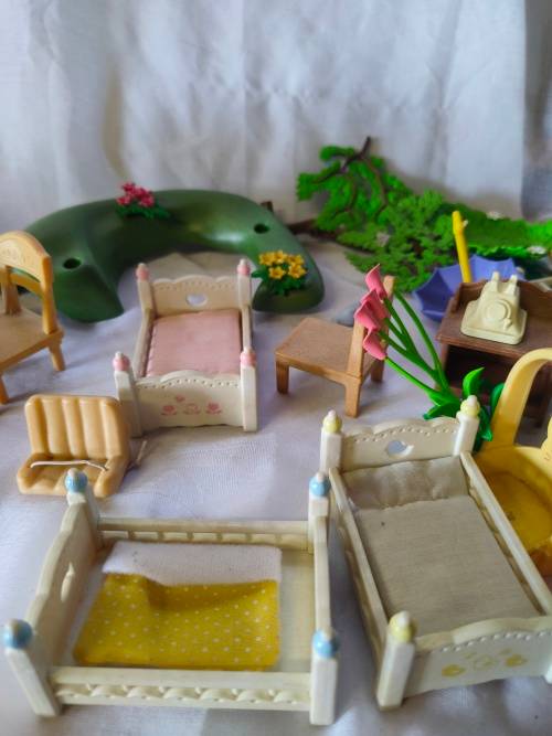 Big lot of original Sylvanian families furniture and outside playset