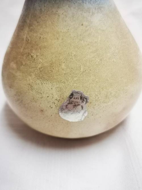 Beautiful vase with an art potteries sticker on - I don`t know who the artist is