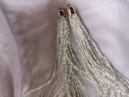 Lovely multi-strand white beaded necklace on offer.