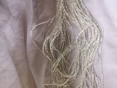 Lovely multi-strand white beaded necklace on offer.