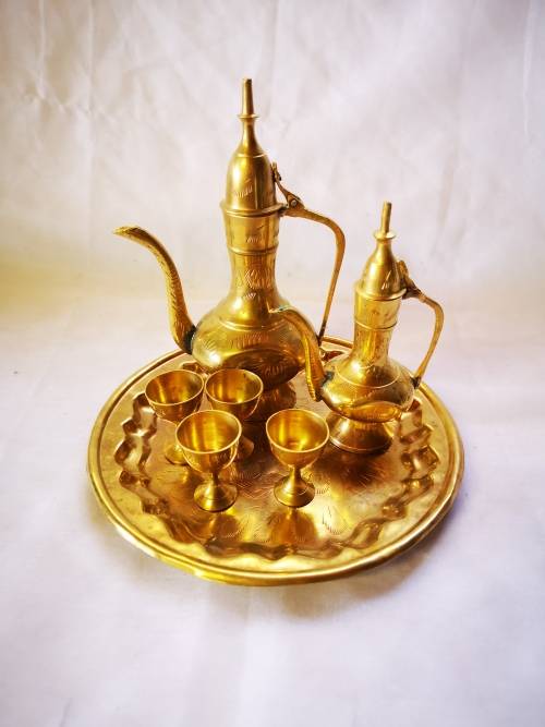 A Lovely vintage brass set - 2 Dallah style wine decanters and glasses on tray.