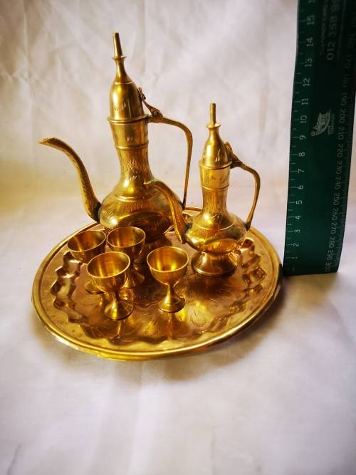 A Lovely vintage brass set - 2 Dallah style wine decanters and glasses on tray.