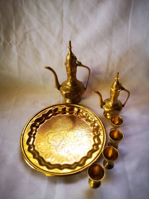 A Lovely vintage brass set - 2 Dallah style wine decanters and glasses on tray.