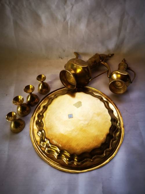A Lovely vintage brass set - 2 Dallah style wine decanters and glasses on tray.