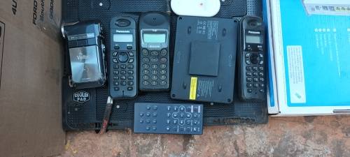 Box of electronics 2xRouters, wireless phones, hand cam,  CPU, cooling pad wires and so on