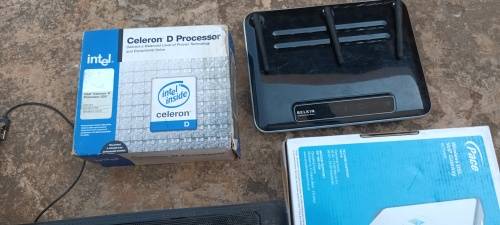 Box of electronics 2xRouters, wireless phones, hand cam,  CPU, cooling pad wires and so on