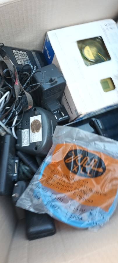 Box of electronics 2xRouters, wireless phones, hand cam,  CPU, cooling pad wires and so on