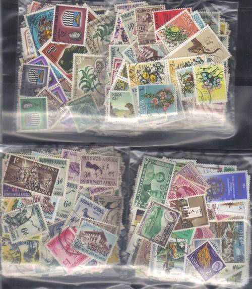 MIXED WORLD  105  USED LOT IN PKTS SOME DUPP.