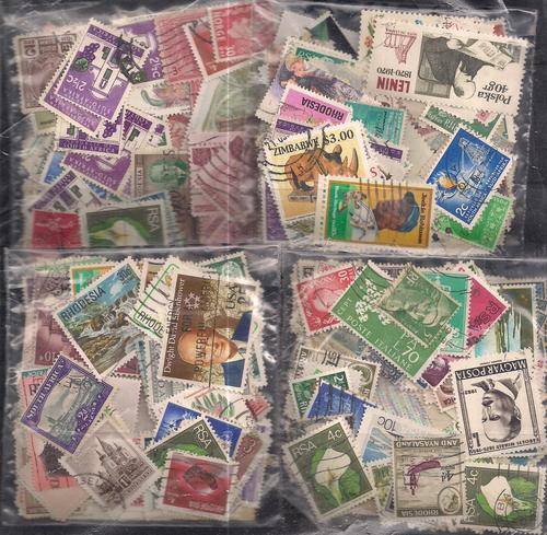 MIXED WORLD USED LOT IN PKTS SOME DOUBLES