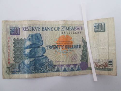 ZIMBABWE 20 DOLLARS CREASED 1997