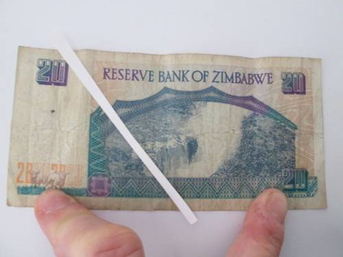 ZIMBABWE 20 DOLLARS CREASED 1997
