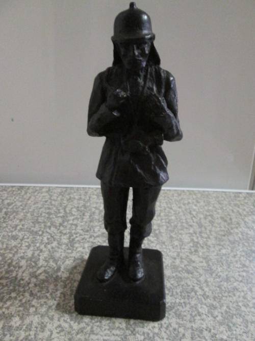Vintage fireman figuirine stone/resin 23cm tall