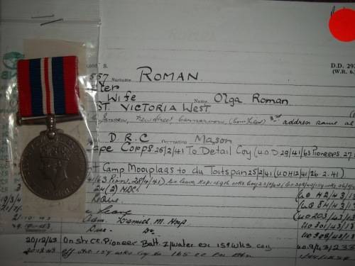 1939 / 45 WAR MEDAL WITH COPY SERVICE CARD ... ROMAN