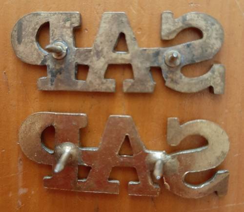 VINTAGE SAP TITLE PAIR -- PINS INTACT